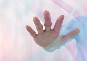 Poster - Hand reaching spread out with sparkling light bokeh background