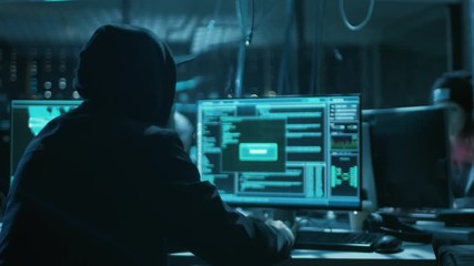 Aufkleber - Hooded Teenage Hacker Successfully Attacks Global Infrastructure Servers with Malware. Display Showing Stages of Hacking in Progress: Exploiting Vulnerability, Executing and Granted Access. 