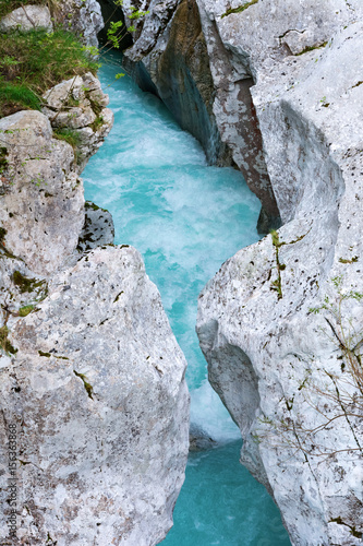 Fotografia  Narrow part of Soca river where you are able to jump over from one side of the r