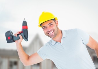 Wall Mural - Carpenter  with drill on building site