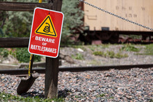 Beware Of Rattlesnakes Sign And Shovel