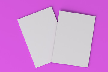 Two blank white closed brochure mock-up on violet background