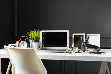 Poster - Office leather desk table with computer, supplies