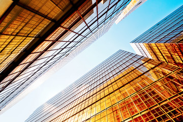 Poster - Glass commercial skyscrapers in perspective