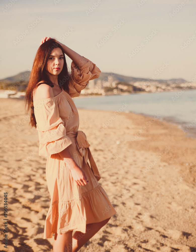 Beautiful woman,posing in boho style beach dress near the sea Stock Photo |  Adobe Stock