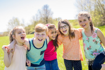 Group of child have fun on a field