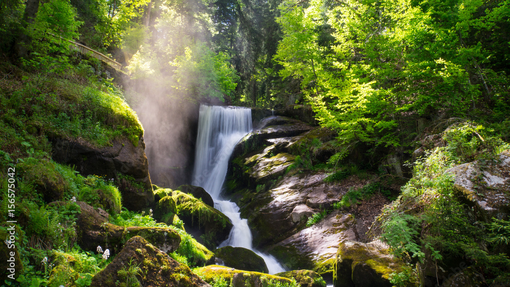 Black Forest - Triberg Waterfall with vapour and sunshine - obrazy, fototapety, plakaty 