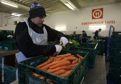 A Volunteer Of The Non Profit Dortmund Food Bank Dortmunder Tafel