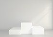© mirexon - empty white room with a pedestal for presentation. 3d rendering.