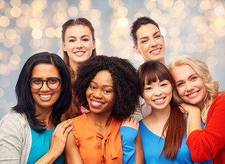 Poster - international group of happy women hugging