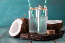 Fresh Organic Coconut Water In A Glass. Food Background