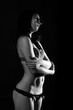 © Dmitry Tsvetkov - young woman perfect body on black background