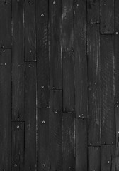 Wall Mural - Black, rustic, rough wooden slats, dark abstract background of hard wood