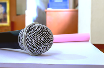 microphone on table, microphone on book, 