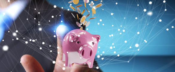 Aufkleber - Businessman holding piggy bank with flying coins going inside 3D rendering