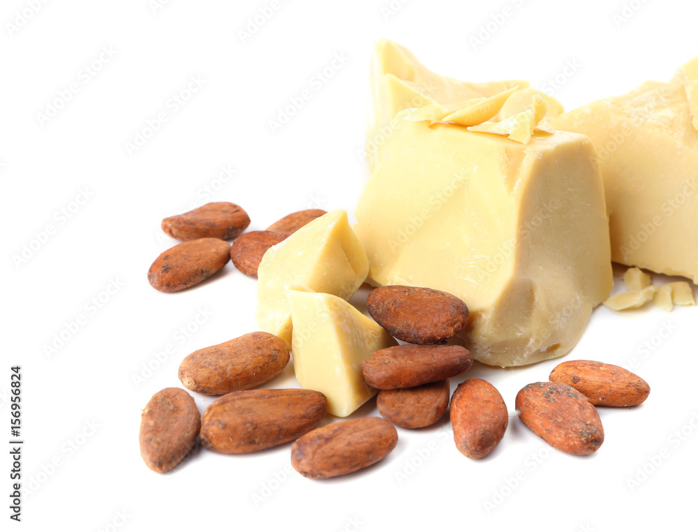Pieces of cocoa butter and beans on white background