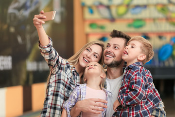 Sticker - Family taking selfie at bowling club