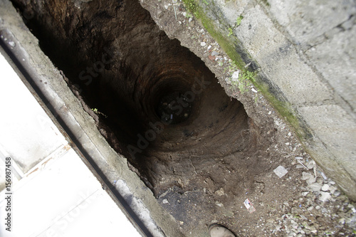 A Sinkhole Is Seen Developing Inside A Property That Houses