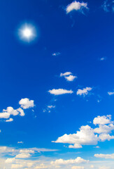 Poster - white fluffy clouds in the blue sky