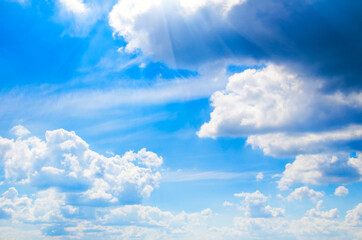 white fluffy clouds in the blue sky