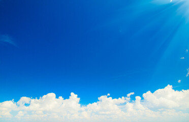 white fluffy clouds in the blue sky