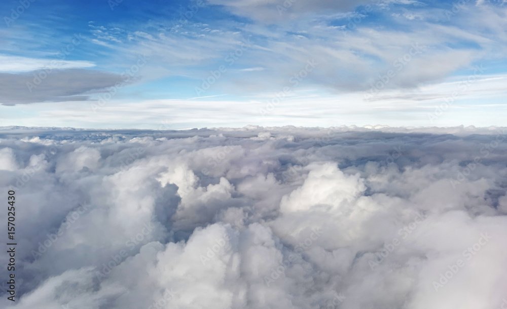 Aerial cloudscape from airplane window. - obrazy, fototapety, plakaty 