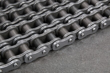 Industrial Driving Roller Chain. Part Of The Chain Drive Of Machine-building Mechanism.