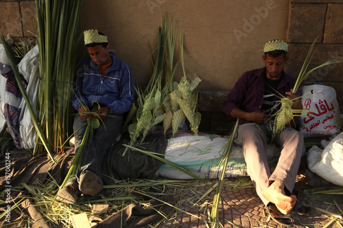 Coptic Christians Weave Palm Leaves To Make Decorations Ahead Of