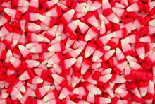 White, Pink And Red Candy Corn Background