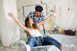 © didesign - Loving couple is having fun while they are renovating house