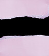 © naiauss - torn paper on black. copy space