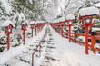 Stone stair and traditional light pole with snow fall in winter at Kifune shrine , Kyoto prefecture , Japan
