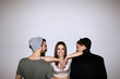 © Photodrive - Happy girl in relationship with two men. Competition of boyfriends, polygamy, parthership of youth, friendship, family, party, first date concept