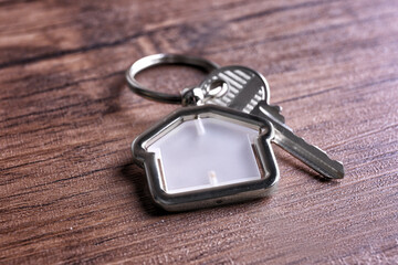 Poster - Key on wooden background