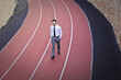 © olly - Businessman on the running track