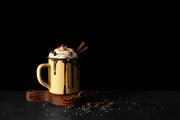 Canvas Print - Sweet dessert with chocolate and cream on black background