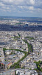 Aerial view of city of Paris from Eiffel tower with beautiful scattered clouds, Paris, France