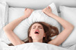 Leinwanddruck Bild - Beautiful woman lying in bed