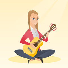 Canvas Print - Woman playing the acoustic guitar.