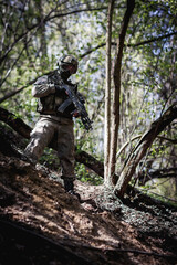 Wall Mural - Soldier in army with gun