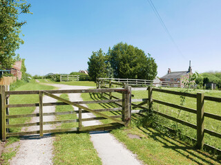 Wall Mural - Closed farm gate