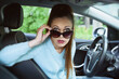 © spaxiax - shocked young woman in the car