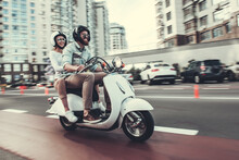 Couple On Scooter