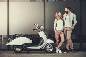 Canvas Print - Couple with a scooter