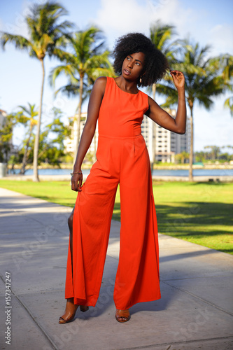 black and orange jumpsuit