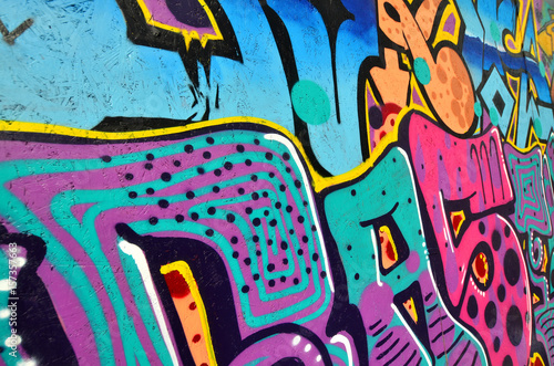Obraz Dibond Art under ground. Beautiful street art graffiti style. The wall is decorated with abstract drawings house paint. Modern iconic urban culture of street youth. Abstract stylish picture on wall