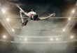 © Andrii IURLOV - Athlete in action of high jump.