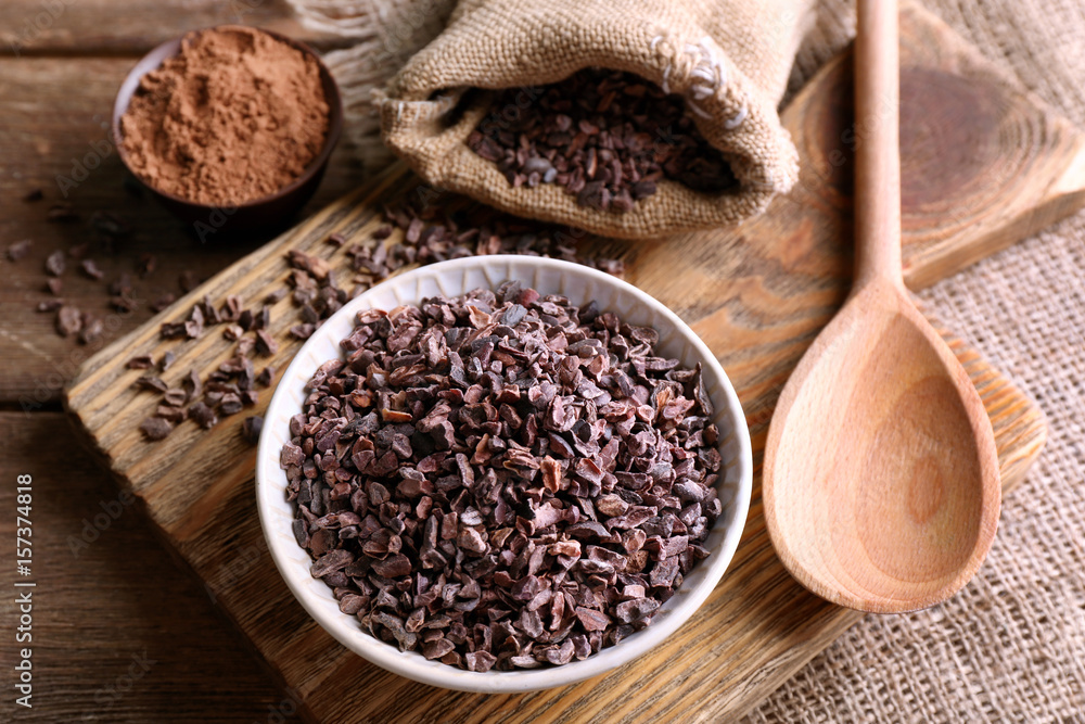 Composition with cocoa nibs on table