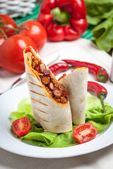 Canvas Print - Burritos filled wiht minced meat, bean and vegetables.