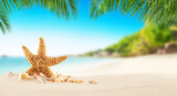 Fototapeta Fototapety do akwarium - Tropical beach with sea star on sand, summer holiday background.